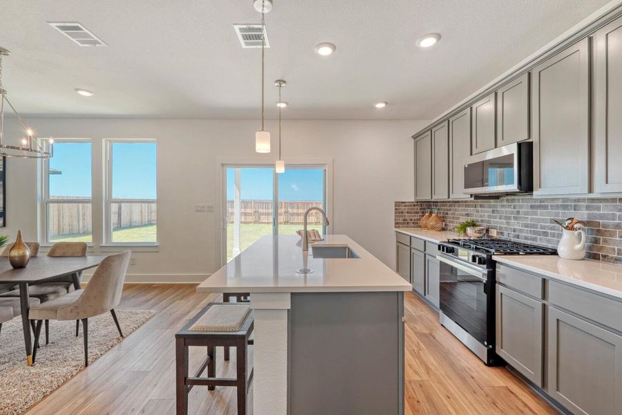 Furnished interior view inside a new home in Freedom at Anthem, Kyle (Image 9).
