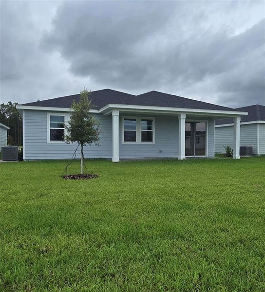 Exterior details and patio area of a home in Colbert Landings, Palm Coast (Image 18).