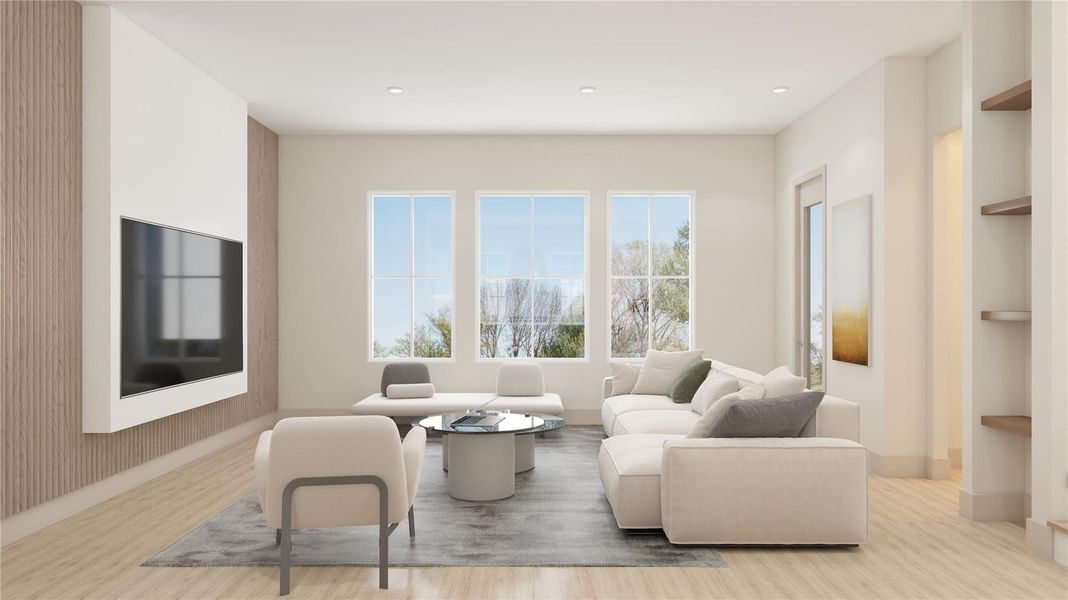 Bright second-floor living area with large windows, natural light, and an open layout.