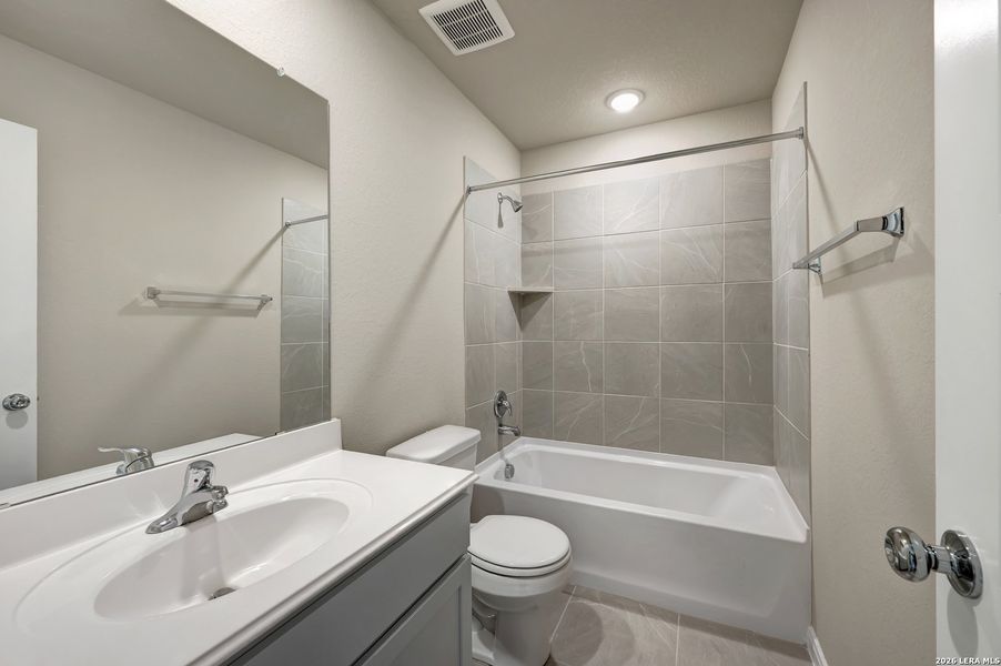 Furnished interior view inside a new home in Greenspoint Heights, Seguin (Image 7).