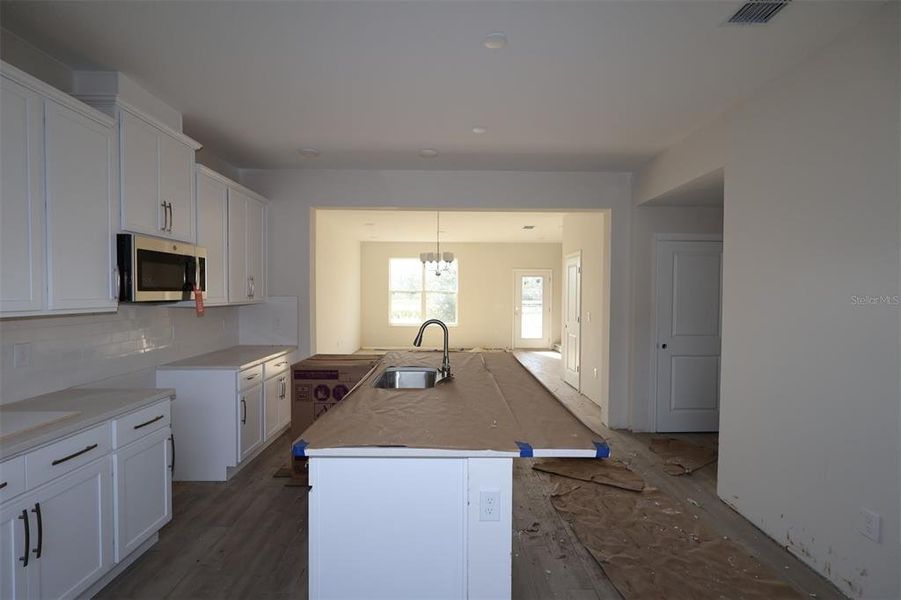 In-progress construction of a new home in Center Lake on the Park, St. Cloud, FL (Image 18).