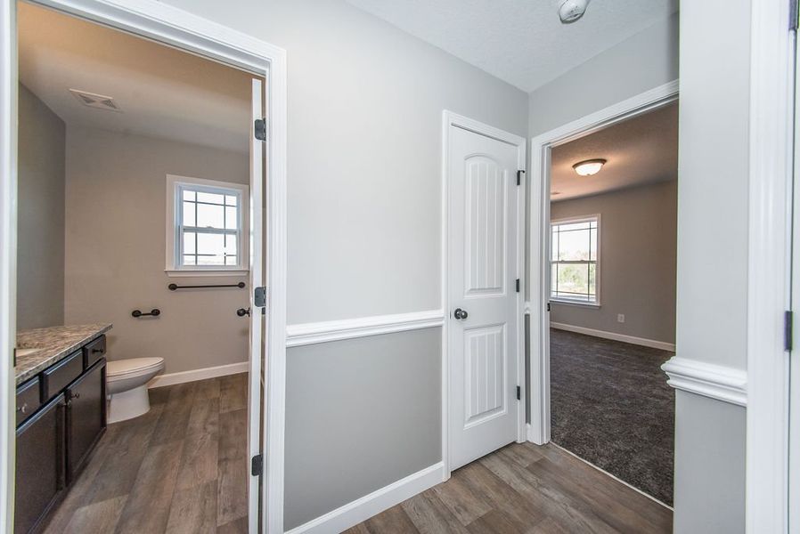 Representative furnished interior of a home built from the Archer by Enchanted Homes in Lonesome Dove, San Antonio (Image 21).