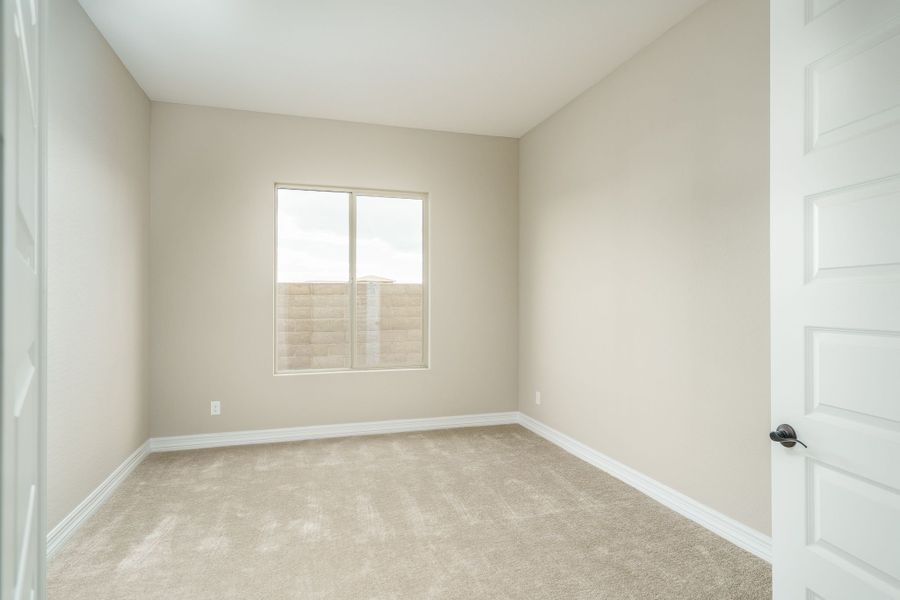 Spacious, unfurnished interior of a new home in Harmony at Montecito in Estrella, Goodyear (Image 42).