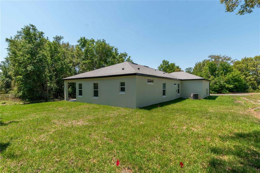 Front exterior of a new home in , Ocala, FL, highlighting curb appeal (Image 1). Front exterior of a new home in , Ocala, FL, highlighting curb appeal (Image 1).