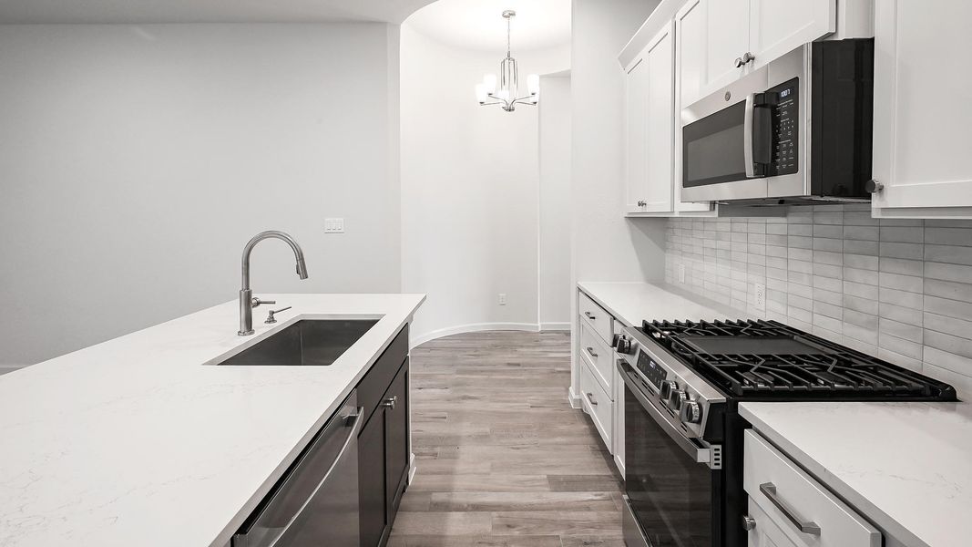 Furnished interior view inside a new home in Crosswinds, Kyle (Image 12).