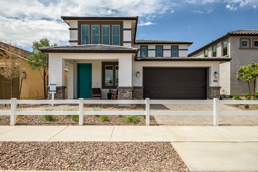 Front exterior of a new home in Mesquite at North Creek, Queen Creek, AZ, highlighting curb appeal (Image 25). Front exterior of a new home in Mesquite at North Creek, Queen Creek, AZ, highlighting curb appeal (Image 25).