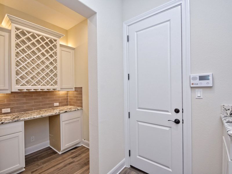 Representative furnished interior of a home built from the San Simeon I by Giddens Homes in Clearwater Ranch, Liberty Hill (Image 225).