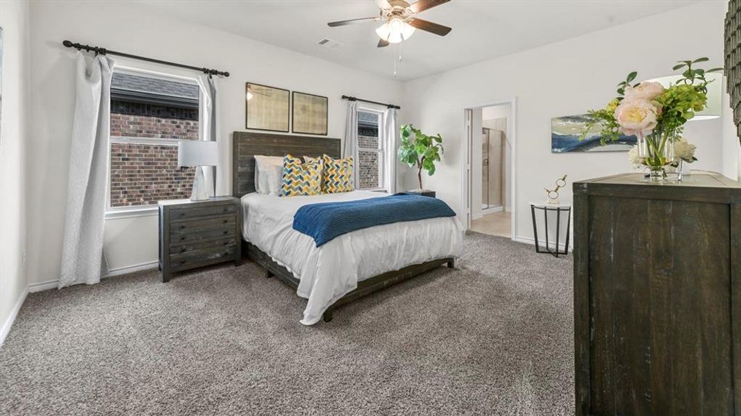 Spacious room featuring neutral carpeting and white walls