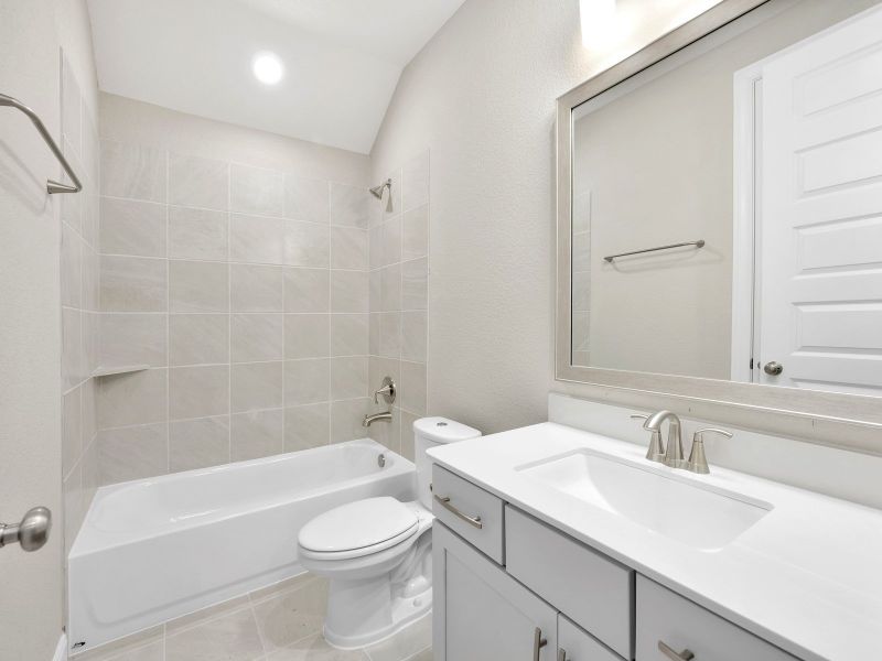 Furnished interior view inside a new home in Pine Lake Cove - Classic Series, Montgomery (Image 4).