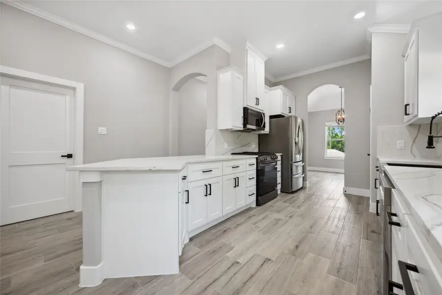 Breakfast bar for additional workspace or seating for larger crowds.