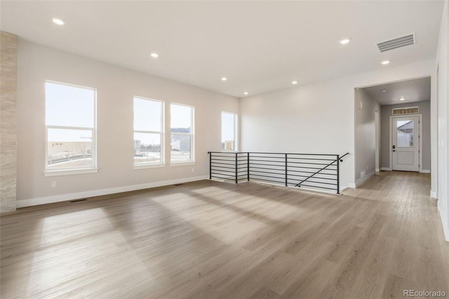 Spacious, unfurnished interior of a new home in Kitchel Lake at Serratoga Falls, Timnath (Image 15).