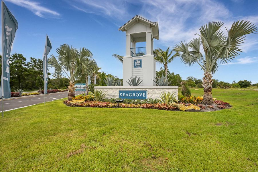 Front exterior of a new home in Seagrove: The Indies, Fort Pierce, FL, highlighting curb appeal (Image 2). Front exterior of a new home in Seagrove: The Indies, Fort Pierce, FL, highlighting curb appeal (Image 2).