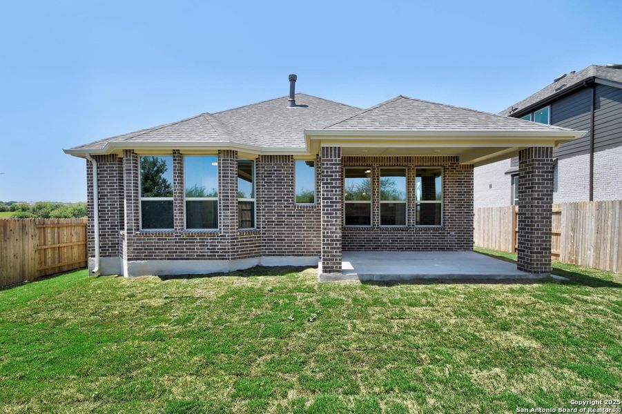 Front exterior of a new home in Homestead, Schertz, TX, highlighting curb appeal (Image 17).