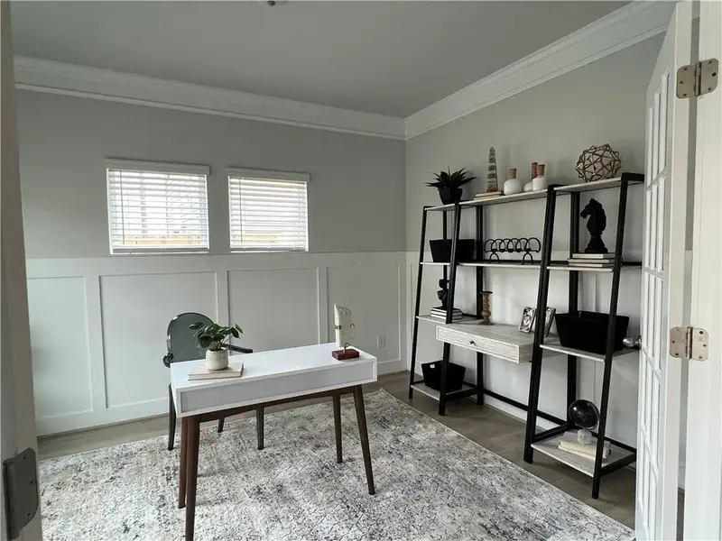 Furnished interior in a model home at The Village at Maple Street in Dawsonville (Image 2).