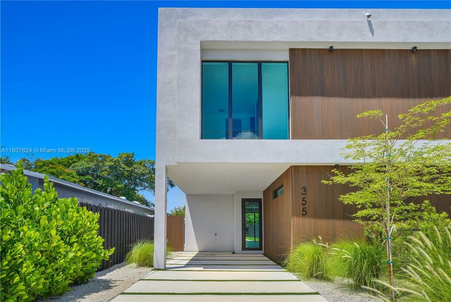 Front exterior of a new home in , Miami, FL, highlighting curb appeal (Image 2). Front exterior of a new home in , Miami, FL, highlighting curb appeal (Image 2).