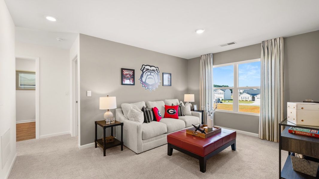 Representative furnished interior of a home built from the HAYDEN Express by D.R. Horton in WillowBrook, Winder (Image 17).