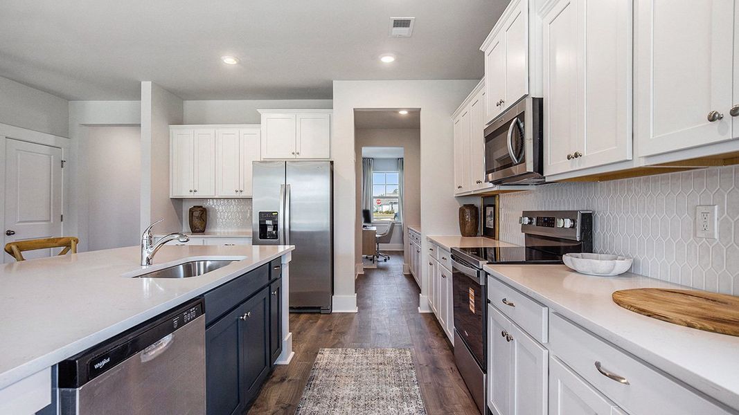 Representative furnished interior of a home built from the HARBOR OAK by D.R. Horton in The Forest at Black Bear, Longs (Image 4).