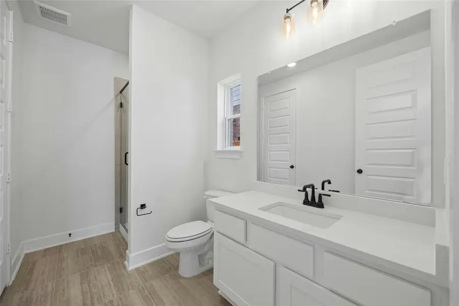 Furnished interior view inside a new home in Flora - 60', Hutto (Image 3).