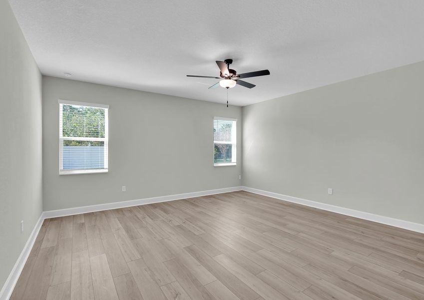 Rest and relaxation await in the master bedroom