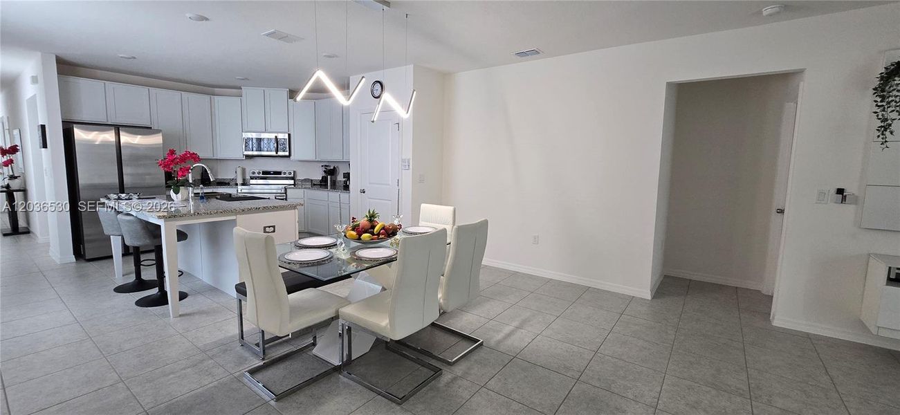 Furnished interior view inside a new home in Hammock Reserve, Haines City (Image 16).