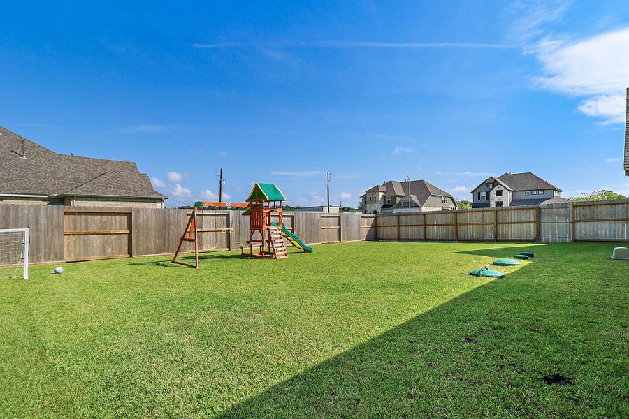 Front exterior of a new home in , Baytown, TX, highlighting curb appeal (Image 19). Front exterior of a new home in , Baytown, TX, highlighting curb appeal (Image 19).