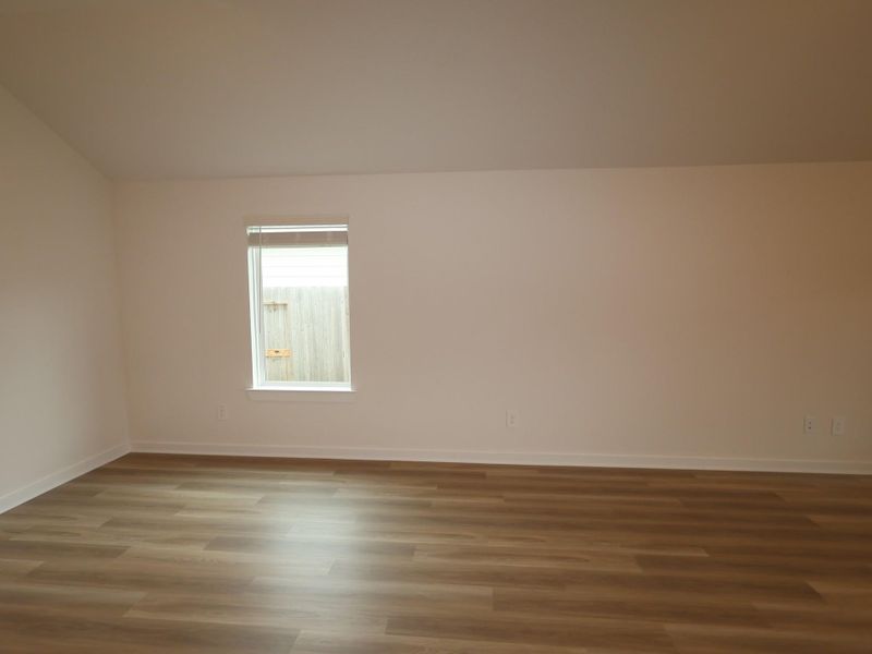 Spacious, unfurnished interior of a new home in Pinewood at Grand Texas, New Caney (Image 14).