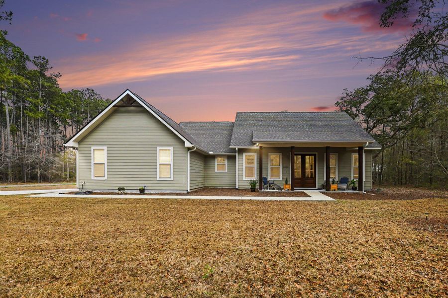 Exterior details and patio area of a home in , Johns Island (Image 27).