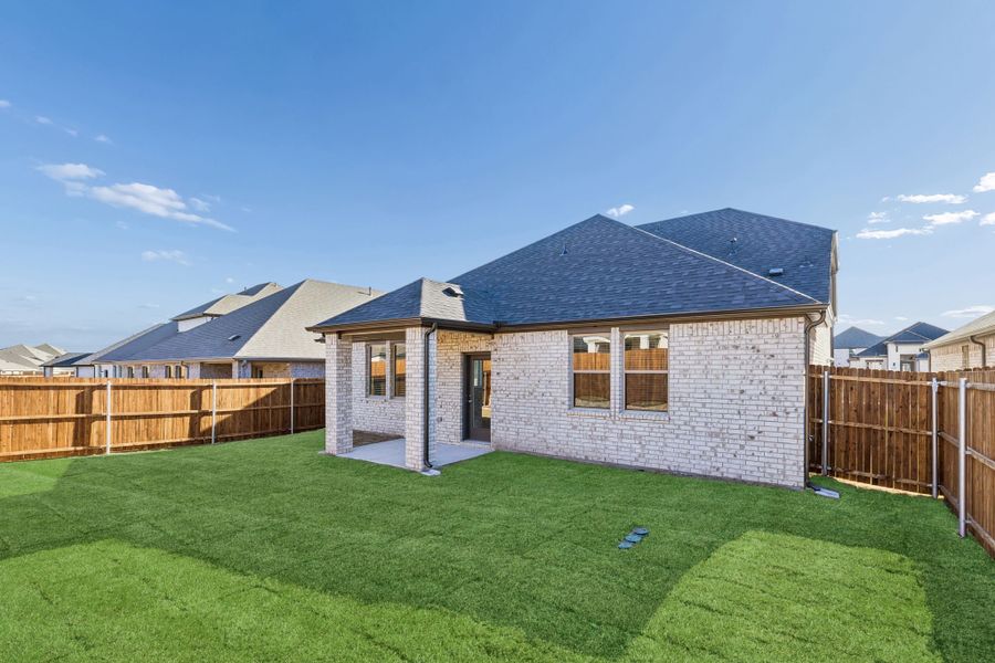 Covered Patio in the Haylee home plan by Trophy Signature Homes - REPRESENTATIVE PHOTO