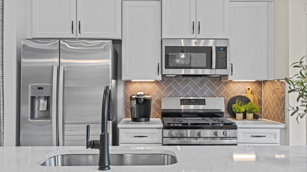 Representative furnished interior of a home built from the Litchfield by DRB Homes in North First Street Townes, Mebane (Image 8).