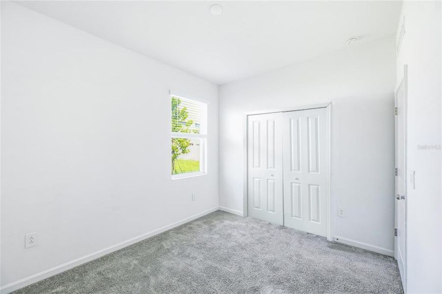 Spacious, unfurnished interior of a new home in Peace Creek Reserve, Winter Haven (Image 37).