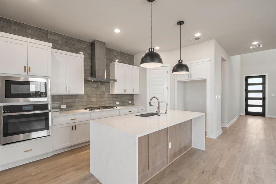 Furnished interior view inside a new home in Arbor Collection at Heritage, Dripping Springs (Image 6).