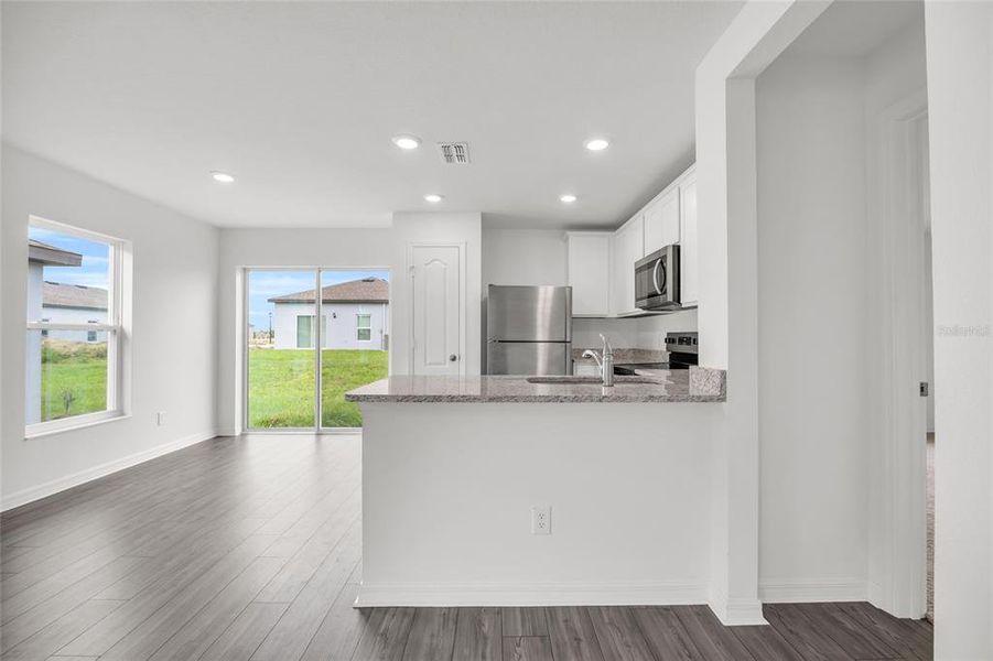Furnished interior view inside a new home in Gum Lake Preserve, Lake Alfred (Image 12).