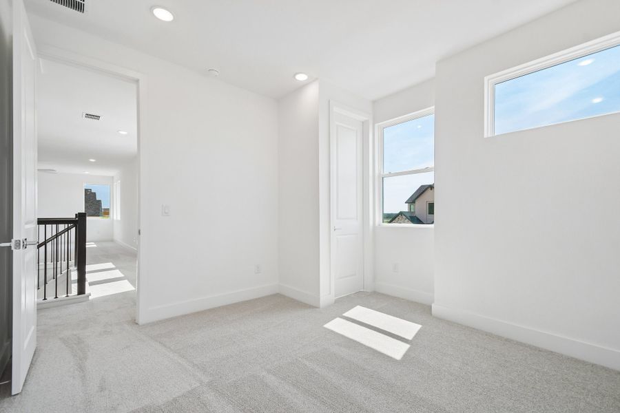 Spacious, unfurnished interior of a new home in Freedom at Anthem, Kyle (Image 21).