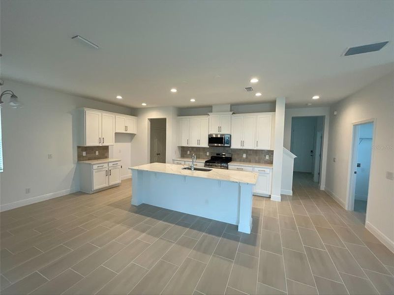Furnished interior view inside a new home in Park View at the Hills, Minneola (Image 4).