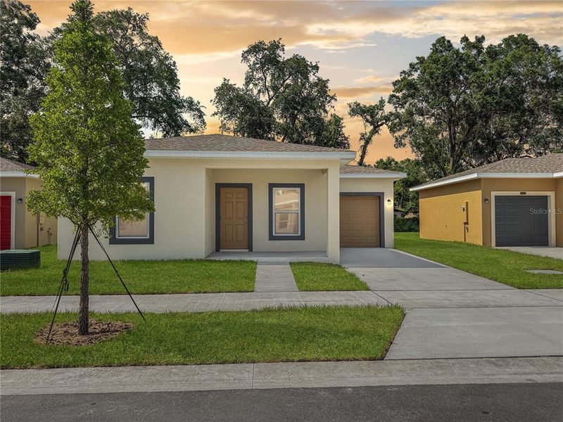 Front exterior of a new home in , Tampa, FL, highlighting curb appeal (Image 2). Front exterior of a new home in , Tampa, FL, highlighting curb appeal (Image 2).