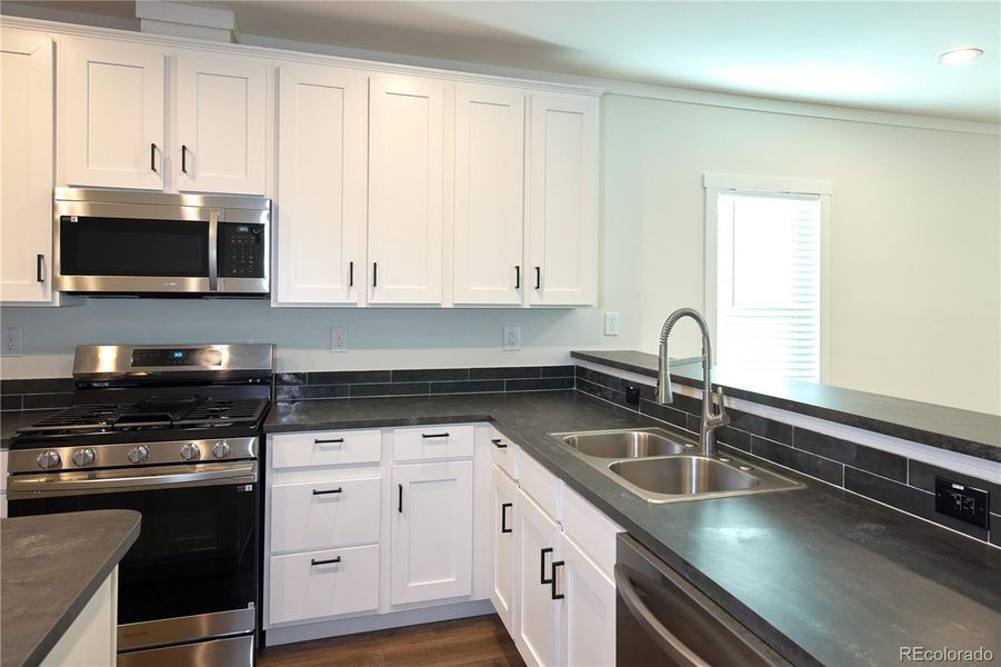 Furnished interior view inside a new home in , Lochbuie (Image 8).