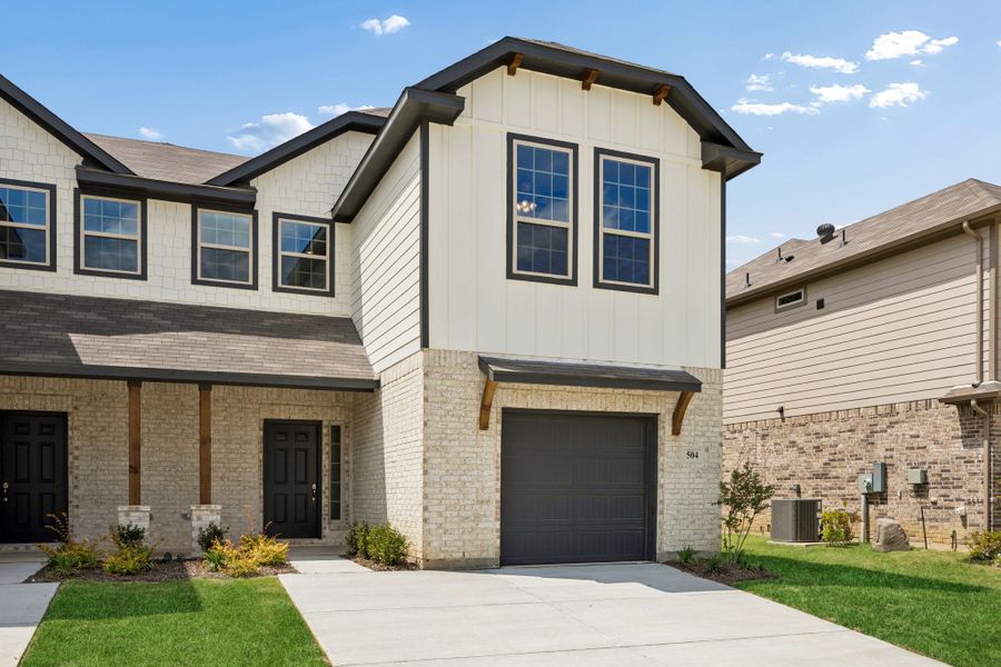 Front exterior of a new home in Eagle Cove, Denton, TX, highlighting curb appeal (Image 2). Front exterior of a new home in Eagle Cove, Denton, TX, highlighting curb appeal (Image 2).