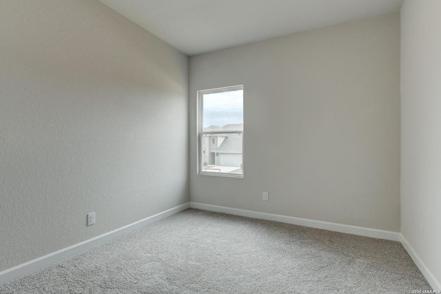 Spacious, unfurnished interior of a new home in Hennersby Hollow, San Antonio (Image 14).