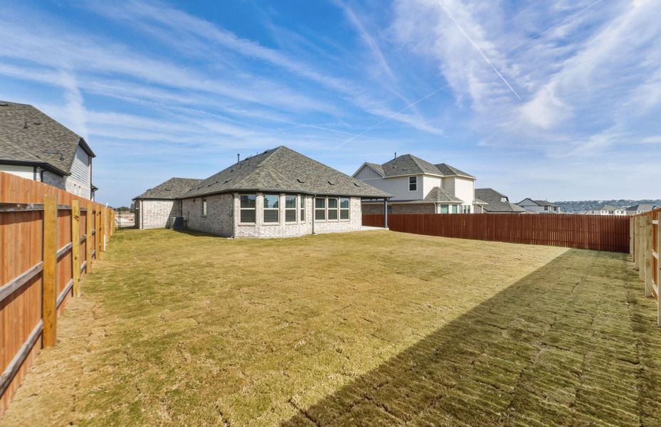 Exterior details and patio area of a home in Saddleback at Santa Rita Ranch, Liberty Hill (Image 4).