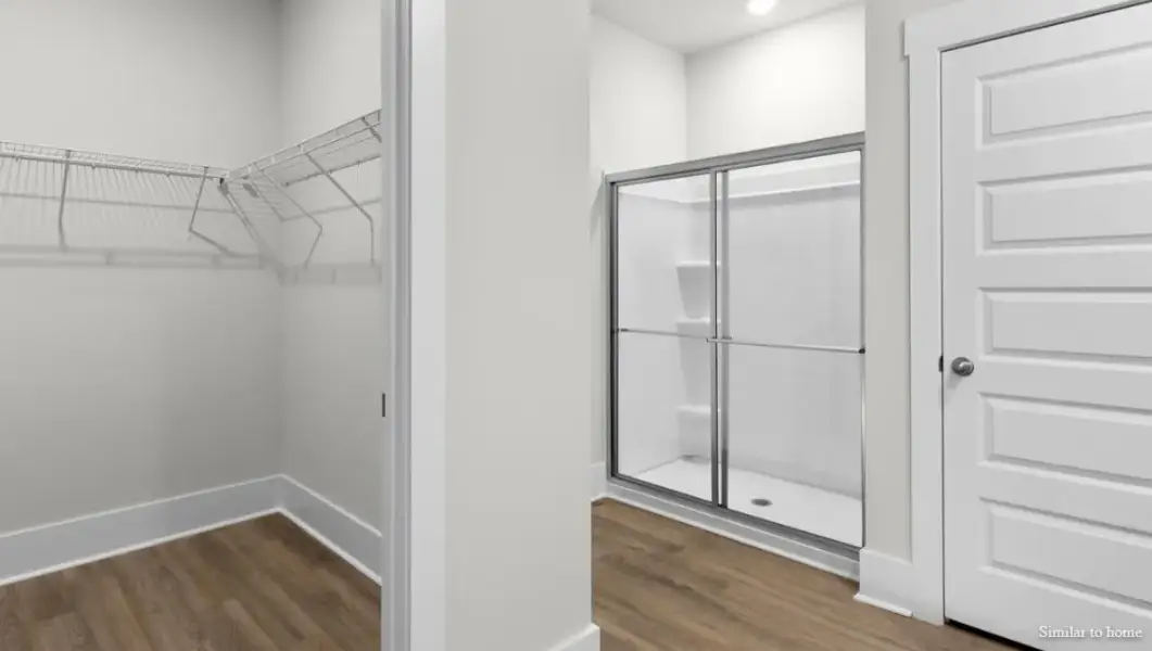 Spacious, unfurnished interior of a new home in The Highlands at Cedar Hill Landing, Navassa (Image 27).