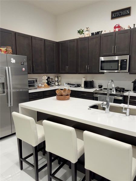 Furnished interior view inside a new home in , Homestead (Image 14). Furnished interior view inside a new home in , Homestead (Image 14).