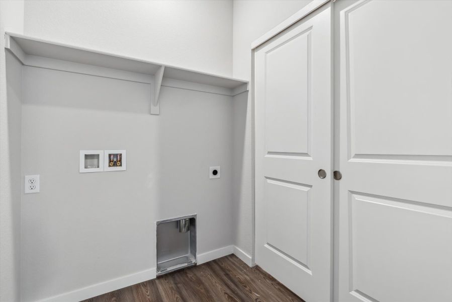 A room with white cabinets.