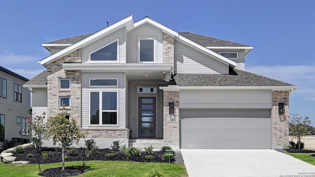 Front exterior of a new home in Esperanza 60', Boerne, TX, highlighting curb appeal (Image 20).