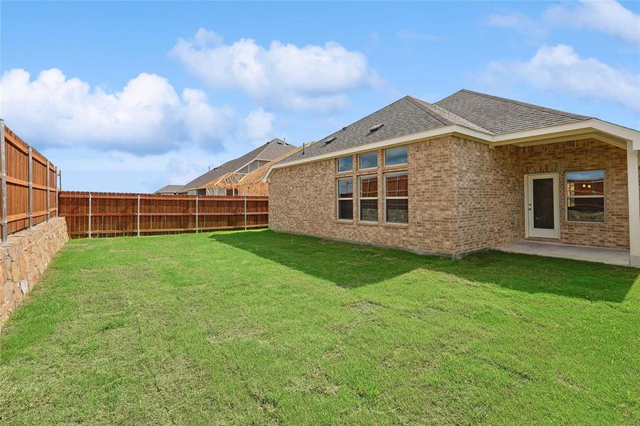 View of yard with a patio