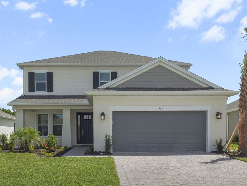 Representative exterior photo of a completed home built from the Bahama by Taylor Morrison in Ardisia Park, New Smyrna Beach, FL (Image 1).