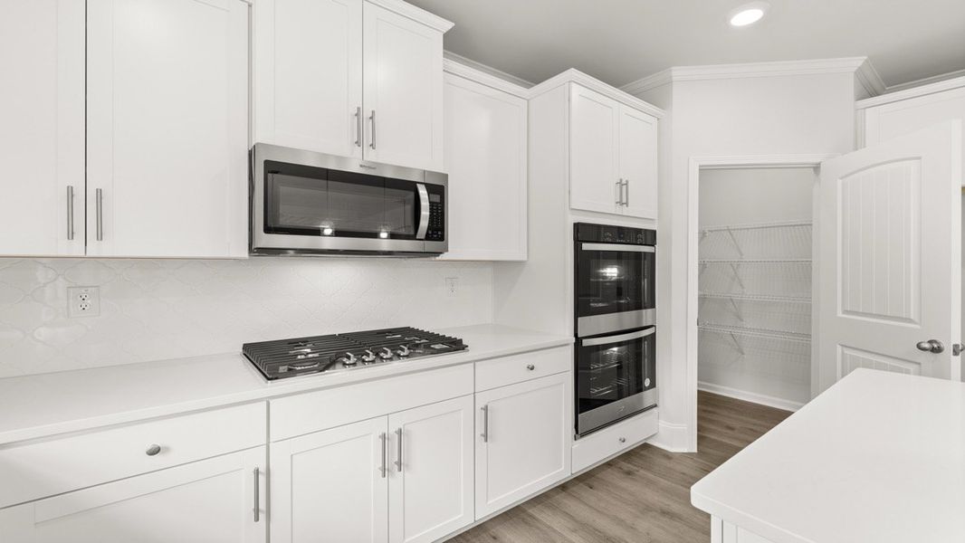 Representative furnished interior of a home built from the GRAYSON by D.R. Horton in Butner Estates, South Fulton (Image 9).