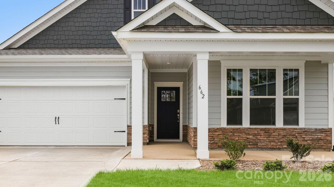 Exterior details and patio area of a home in Tap Root Farms, Fletcher (Image 4). Exterior details and patio area of a home in Tap Root Farms, Fletcher (Image 4).