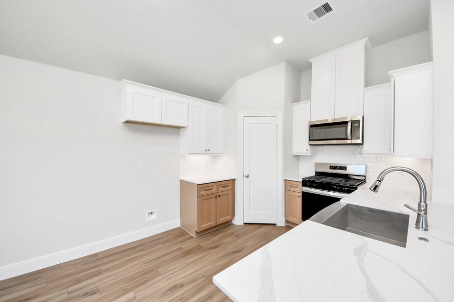 Furnished interior view inside a new home in Grand Oaks Reserve, Cleveland (Image 12).