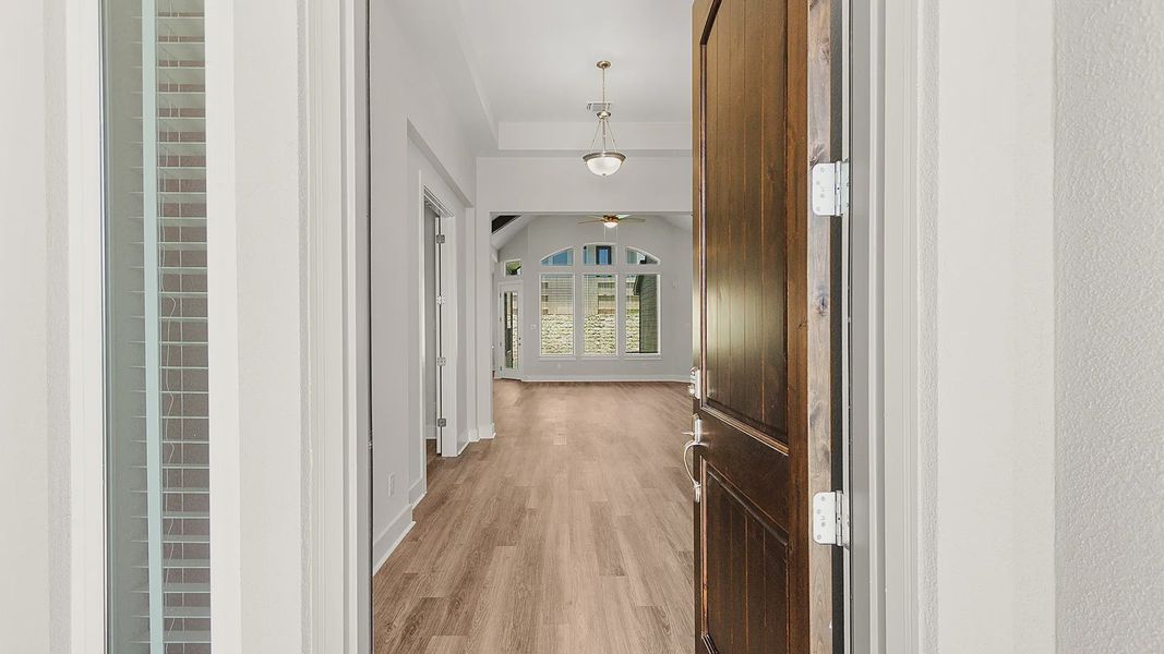 Representative unfurnished interior of a home built from the Brenner by Chesmar Homes in Newhaven, Manor (Image 20).