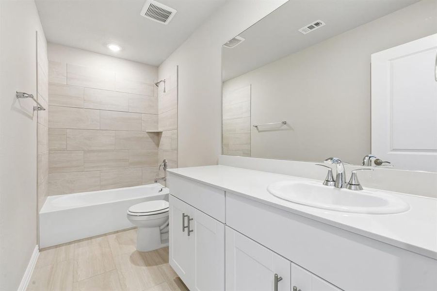 Furnished interior view inside a new home in Parks at Foster Crossing - Signature Series, Anna (Image 14).